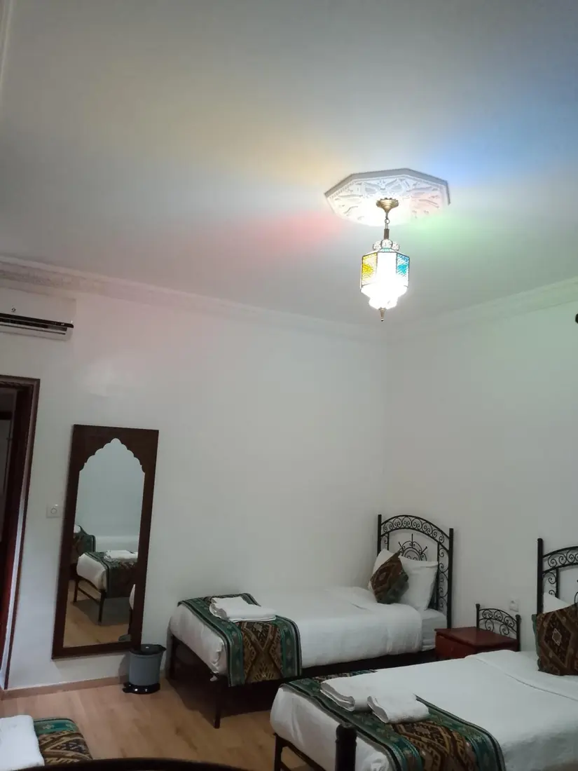 Une chambre à lits simples de la maison